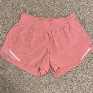 Peach lululemon shorts